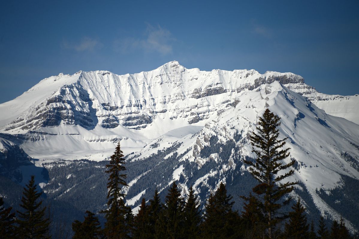 22B Mount Brett, Massive Mountain Mid-Day From Bow River Bridge In Banff In Winter